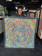 Load image into Gallery viewer, Person holding a colorful circular artwork in an indoor setting