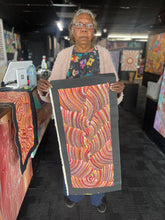Load image into Gallery viewer, Artist Photo Maureen Hudson Nampijinpa holding Sand Dunes Tali Artwork