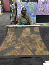 Load image into Gallery viewer, Roseanne with her painting Bush Plum 98cm x 95cm Utopian Artist from Northern Territory