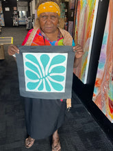 Load image into Gallery viewer, Debra Nangala Mcdonald Artist Photo of small Mulga Leaves painting in gallery
