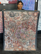 Load image into Gallery viewer, Bernadine Johnson holding painting