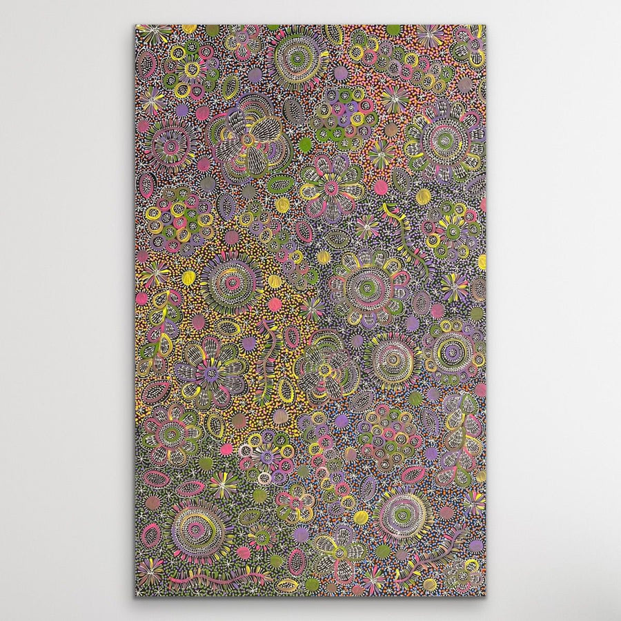 Aboriginal painting Belinda Golder Kngwarreye 154cm x 94cm My Country displayed on white wall featuring flowers, seeds and bush tuckers from Utopia
