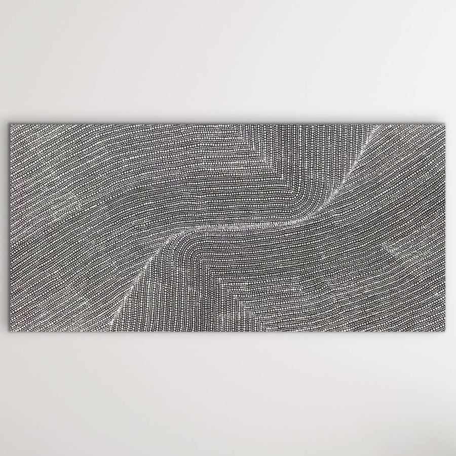 A black and white abstract painting consisting of wavy lines filling the canvas.