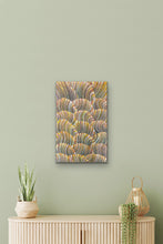 Load image into Gallery viewer, Australian painting on a wall above a wooden cabinet with decorative items.