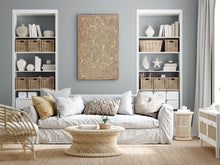 Load image into Gallery viewer, George Hairbrush Tjungurrayi Gibrson Desert Artist Pupunya painting displayed in living room with white sofa, wicker coffee table, and bookshelves.