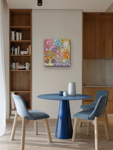 Load image into Gallery viewer, Modern dining area with a blue table and chairs, wooden bookshelf, and colourful Aboriginal wall art.