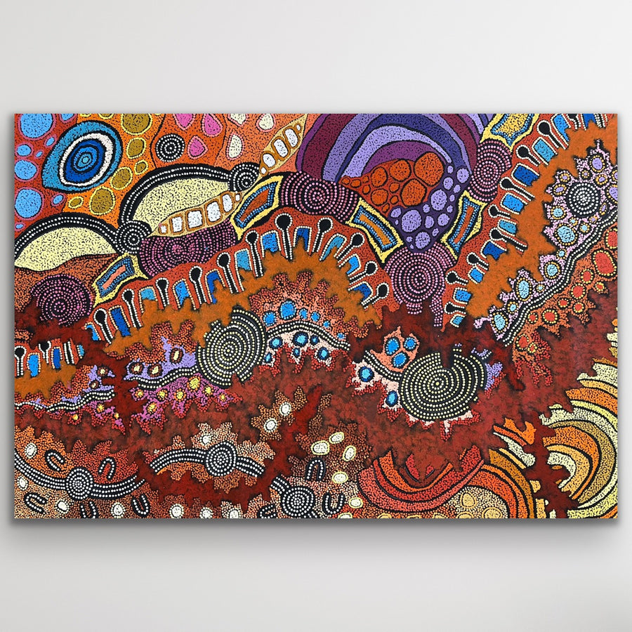 Large My Country painting with bold reds, oranges and intricate dot work by Damien and Yilpi Marks.