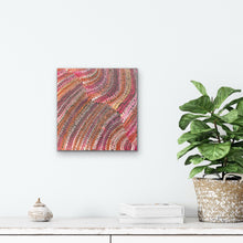 Load image into Gallery viewer, Sand Dunes painting with red, pink and orange colours displayed on wall in living area