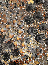 Load image into Gallery viewer, Close-up of Yam Dreaming with circular shapes in brown, black, and orange.