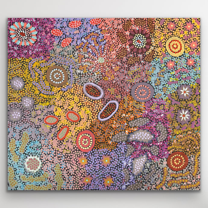 A vibrant mosaic of pink, gold and violet tones symbolising connection and harmony across Country.