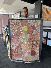 Load image into Gallery viewer, Farron holding his own original painting
