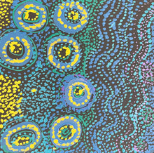 Load image into Gallery viewer, Colorful Caterpillar Dreaming with blue, yellow, and green circles on a dark background
