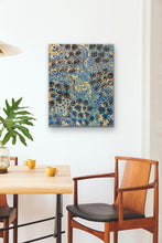 Load image into Gallery viewer, Yam Dreamtime Story painting on a wall above a dining table with chairs.
