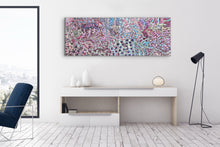 Load image into Gallery viewer, Modern interior with a colorful pink, blue and cyan aboriginal painting on a white wall.
