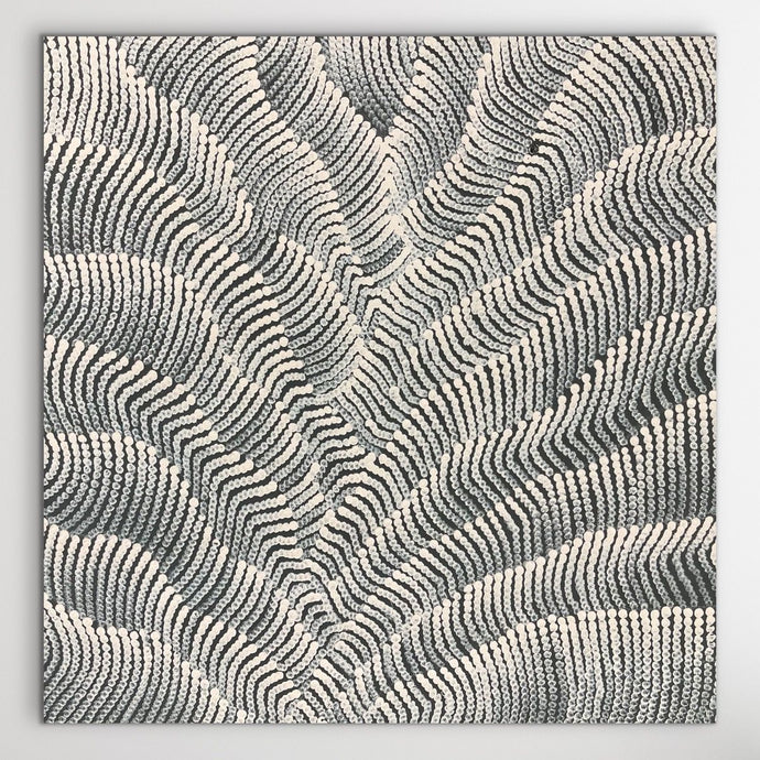 Sand Dunes painting with white on black background on a white wall