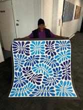 Load image into Gallery viewer, Debra McDonald holding her painting "Bended Acacia Leaves (Watiya Tjuta)" 
