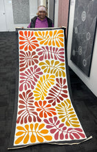 Load image into Gallery viewer, Artist photo Debra Nangala holding painting Mulga Leaves

