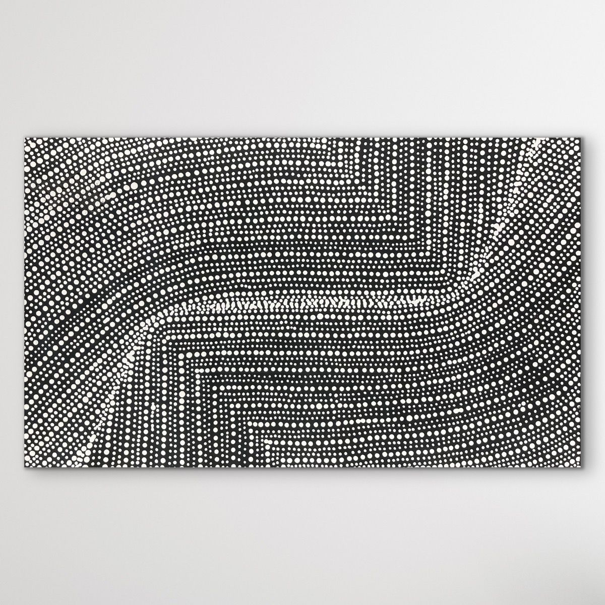 Black and white Aboriginal pattern on a black background