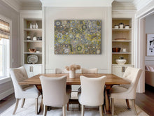 Load image into Gallery viewer, Dining room with wooden table and white chairs, featuring a colorful Aboriginal painting on the wall.
