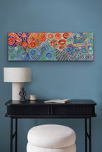 Load image into Gallery viewer, Bush Flowers Bloom Aboriginal artwork by Bernadine Johnson Kemarre featured in living room decor
