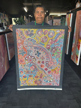 Load image into Gallery viewer, Artist holding bush flowers painting
