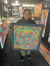 Load image into Gallery viewer, Photo of Bernadine Johnson Kemarre presenting her Circle of Life (A) painting inside Art by Farquhar Aboriginal Art Gallery, Edwardstown.
