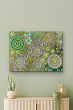 Load image into Gallery viewer, Budgerigar Dreaming Wild Green Country Aboriginal print displayed in a bright living room interior
