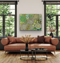 Load image into Gallery viewer, Aboriginal art print Budgerigar Dreaming Wild Green Country displayed in lounge room overlooking garden
