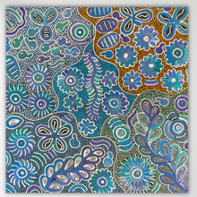 Load image into Gallery viewer, "Bush Flowers" Bernadine Johnson Kemarre 60cm x 59cm artwork filled with dense floral and organic dot patterns in blue, teal, purple, brown, and white, shown against a light neutral background.
