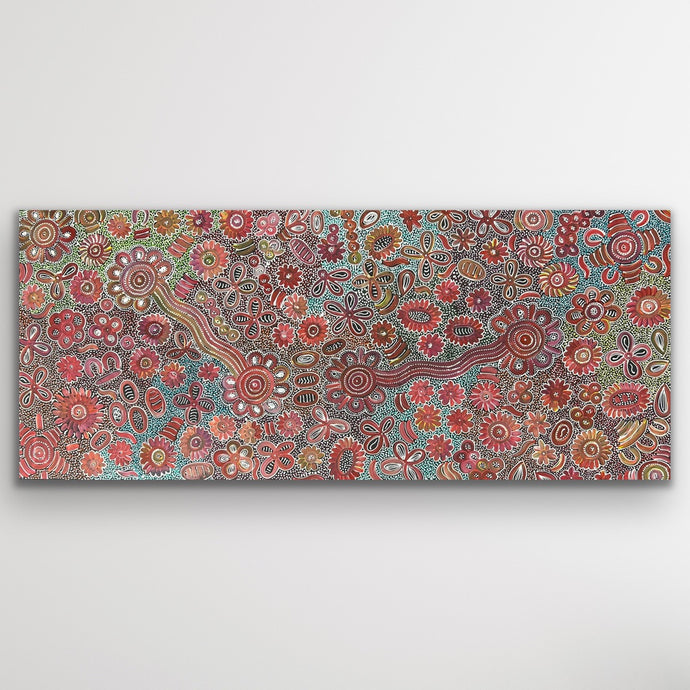 A stunning full view showing intricate dot patterns symbolising desert flora in bloom.
