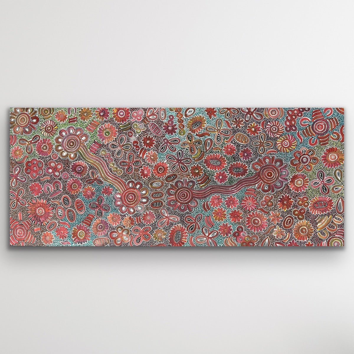 A stunning full view showing intricate dot patterns symbolising desert flora in bloom.