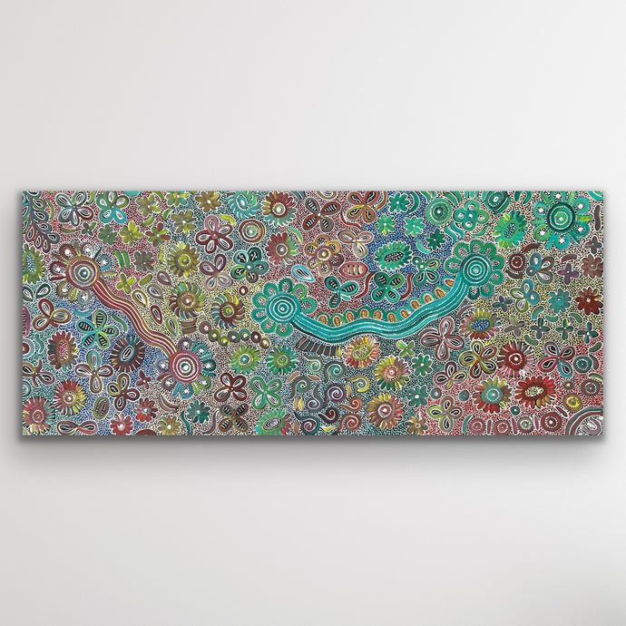 Wide landscape image showing Bush Flowers by Bernadine Johnson Kemarre with fine dot work and luminous floral detail.