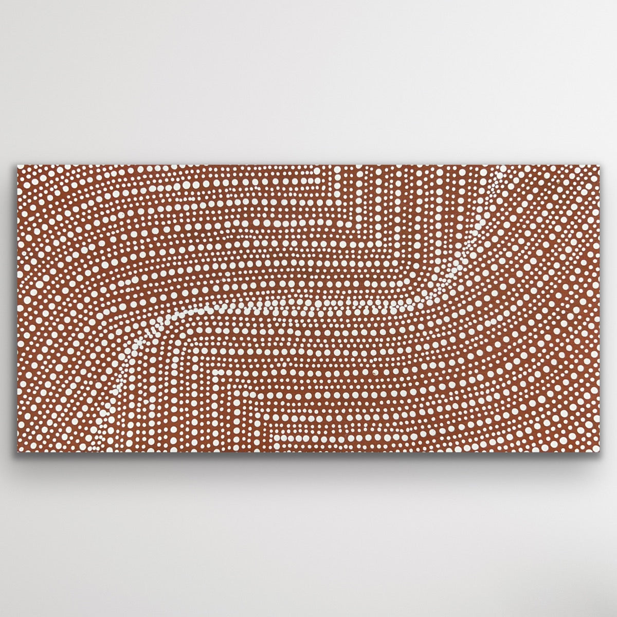 Fine dot patterns trace the pathways and seeds of the bush onion beneath warm desert tones.