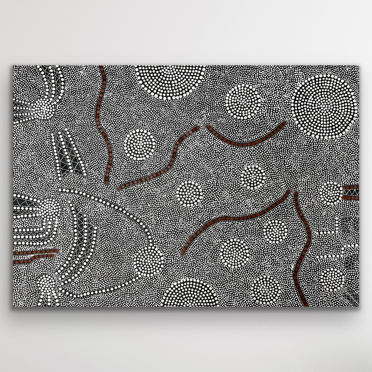 Fine dot patterns and earthy textures evoke the Central Desert landscape and the harvest of bush onions.