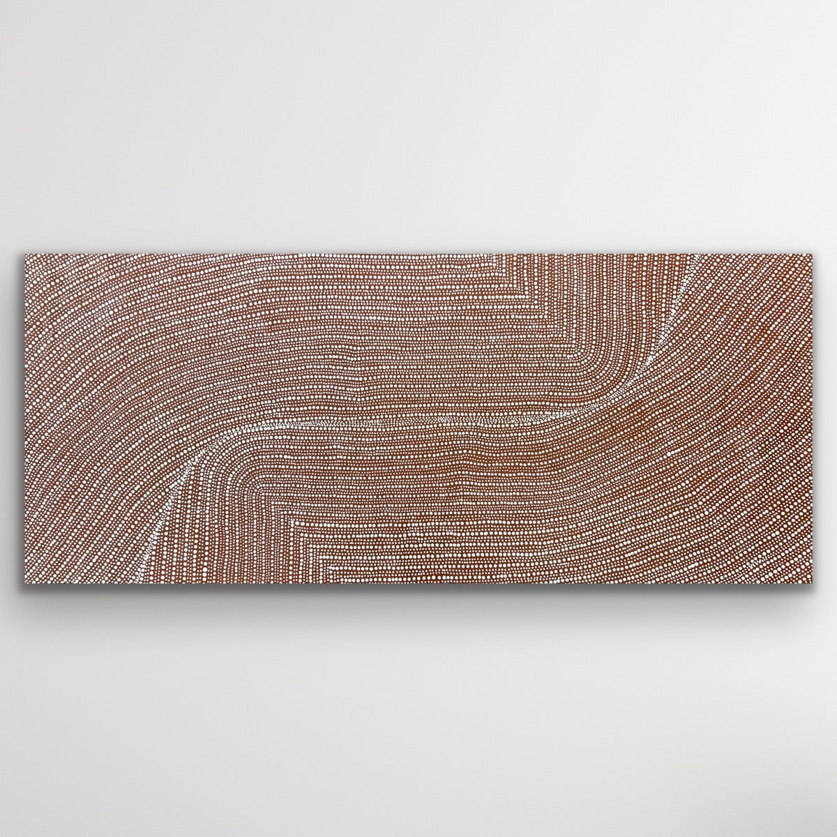 Wide photo of Bush Onion by Tansy Martin featuring earthy tones, circular dot patterns and symbolic desert tracks.