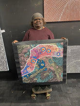 Load image into Gallery viewer, Carolanne Ken holding her painting 
