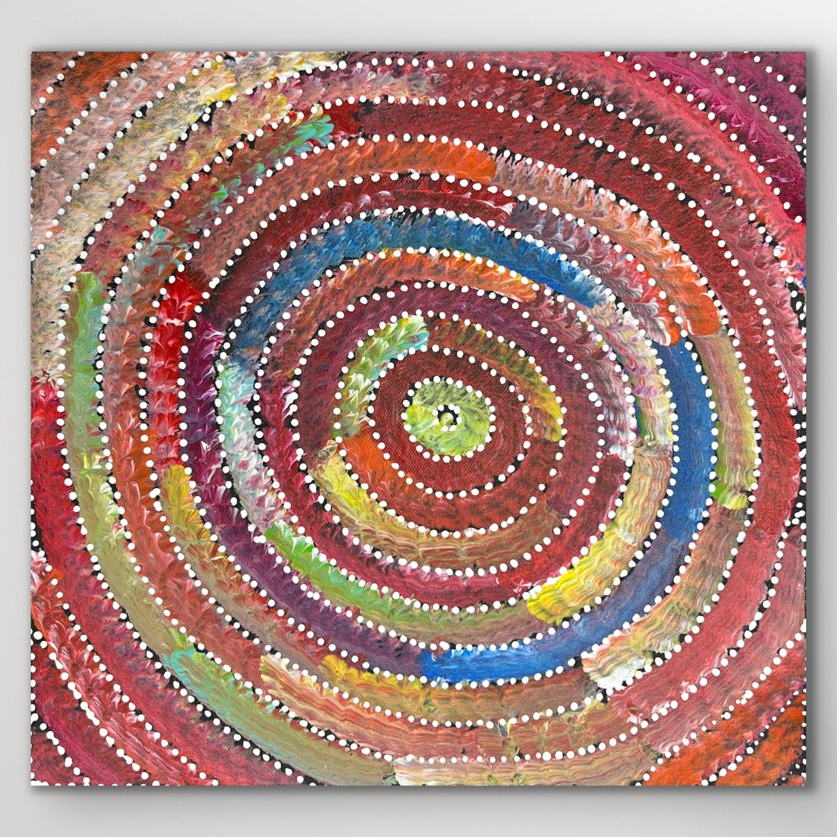 Full view showing layered circular patterns symbolising life cycles and connection to Country.