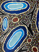 Load image into Gallery viewer, Abstract artwork with blue circular patterns and multicolored dots on a black background "Seven Sisters" Pollyanne Smith Tjungkaya 60cm x 59cm
