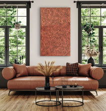 Load image into Gallery viewer, Modern living room with a brown leather sofa, decorative pillows, and a patterned Tingari Indigenous Art piece.
