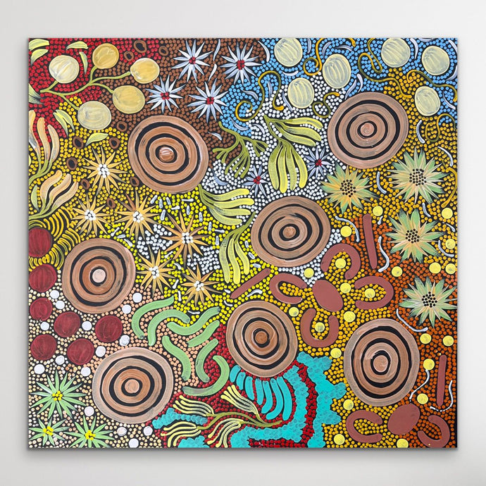 Colorful square artwork with various patterns and shapes on a white background