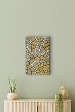 Load image into Gallery viewer, "My Country" Maureen Nampijinpa Hudson 92cm x 60cm wall art on a green wall with a wooden cabinet and plants below.
