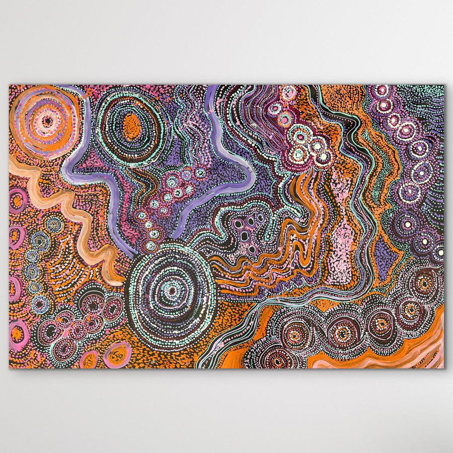 Colorful Indigenous artwork with swirling patterns on a white background