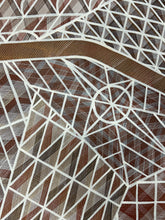 Load image into Gallery viewer, Detailed section with layered rarrk (cross-hatching) technique in ochre and white.
