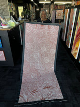 Load image into Gallery viewer, Close-up of finely dotted pattern work showing interconnected motifs that represent desert plants and bush bean gathering sites.
