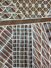 Load image into Gallery viewer, Close up of the painting showing fine geometric patterns and earthy pigments.
