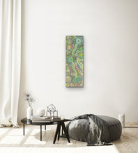 Load image into Gallery viewer, Flourishing Country print displayed in a modern living room with neutral décor.
