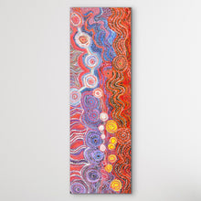 Load image into Gallery viewer, Full view of Rhoda Tjitayi’s Pututju (Anumara Tjukurrpa / Caterpillar Dreaming) Aboriginal Australian artwork, a 115cm x 40cm vertical painting with vibrant red, blue, purple, orange and yellow patterns.
