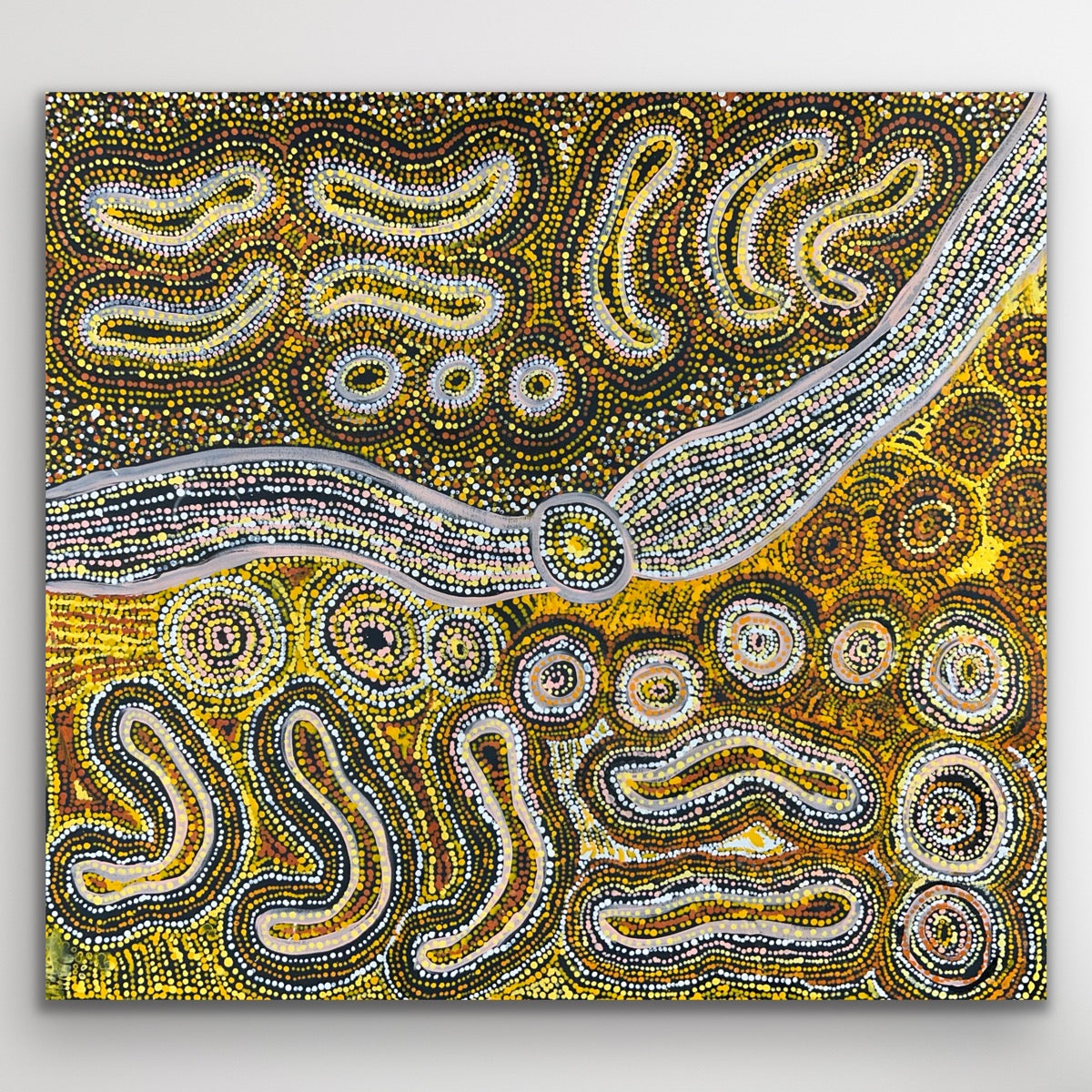 Warm ochre tones and pale silver pathways flow across the canvas in this story of movement and creation.