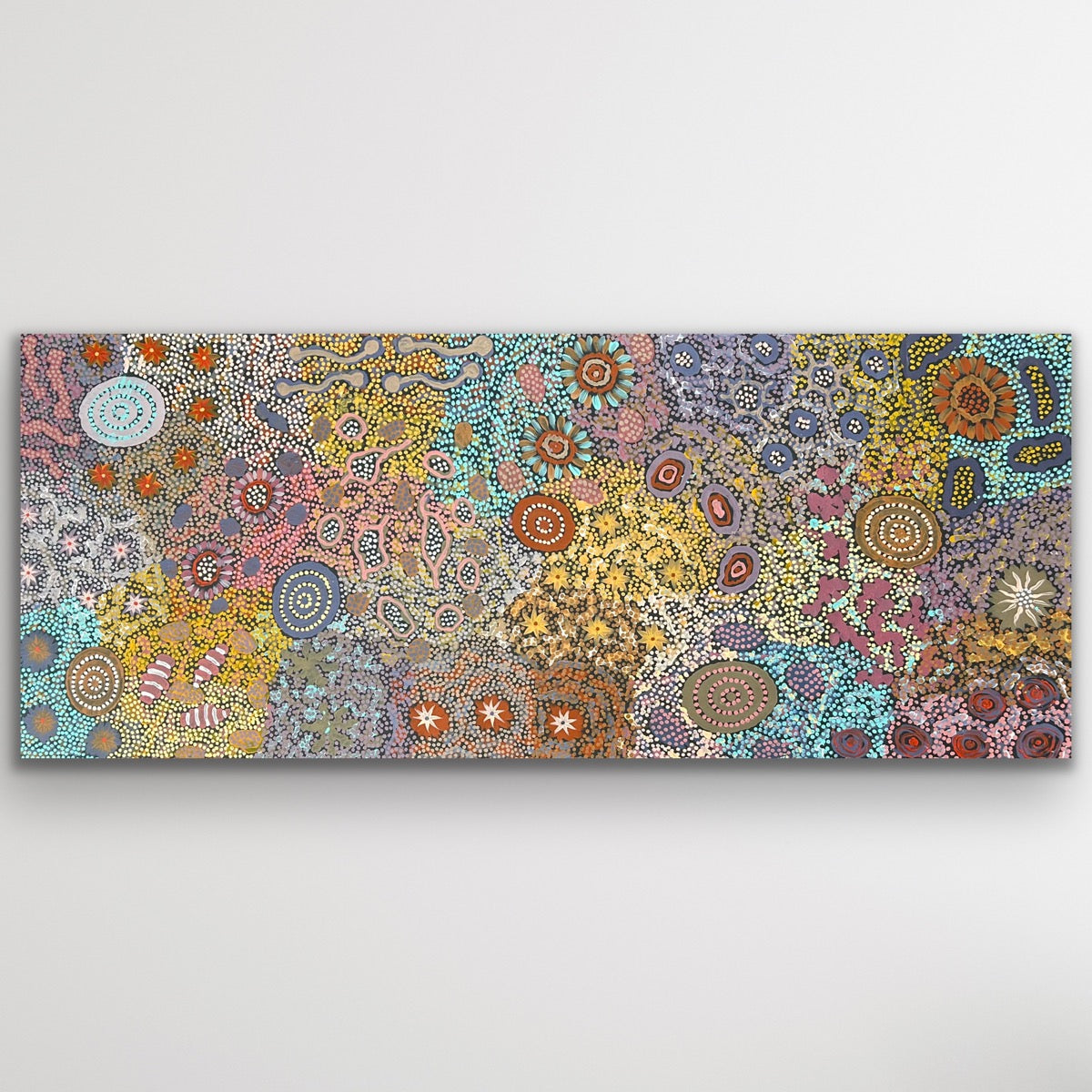 A stunning aerial composition alive with intricate dot work and patterns symbolising sacred sites around Yuelamu.