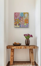 Load image into Gallery viewer, Michelle Possum painting on a wall above a wooden console table with a vase and fruit.
